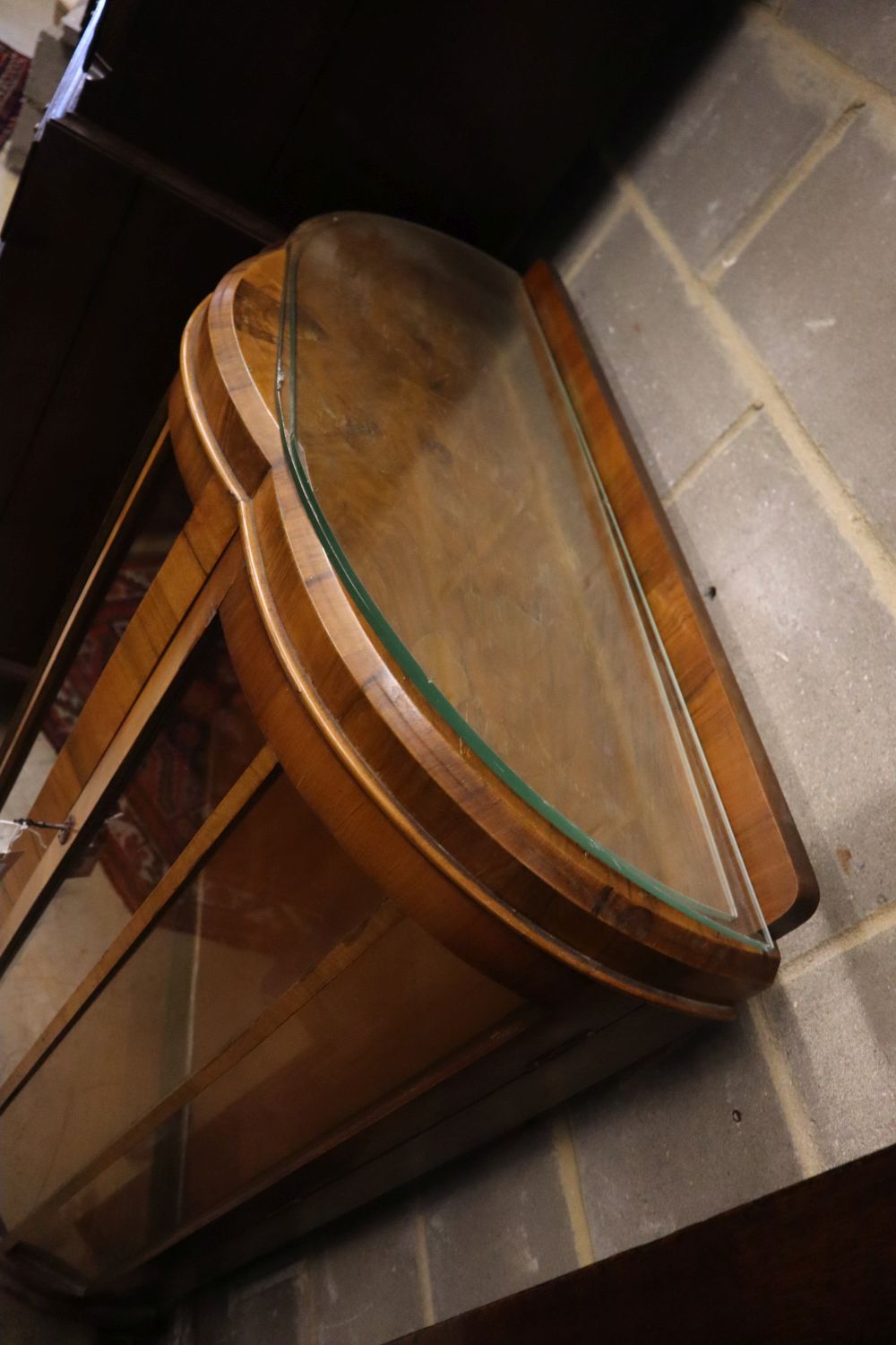 A walnut bowfront display cabinet, width 92cm depth 40cm height 124cm